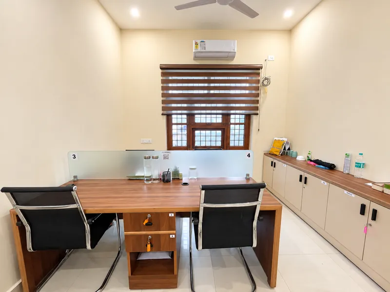 Private coworking cabin with two workstations, lockable drawers and storage cabinets